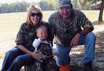My great-grandson Cole Simpson in his camouflage with grandparents Pam and Corky