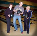 Striking a bowling pose with Aslak and Helen Cornelius